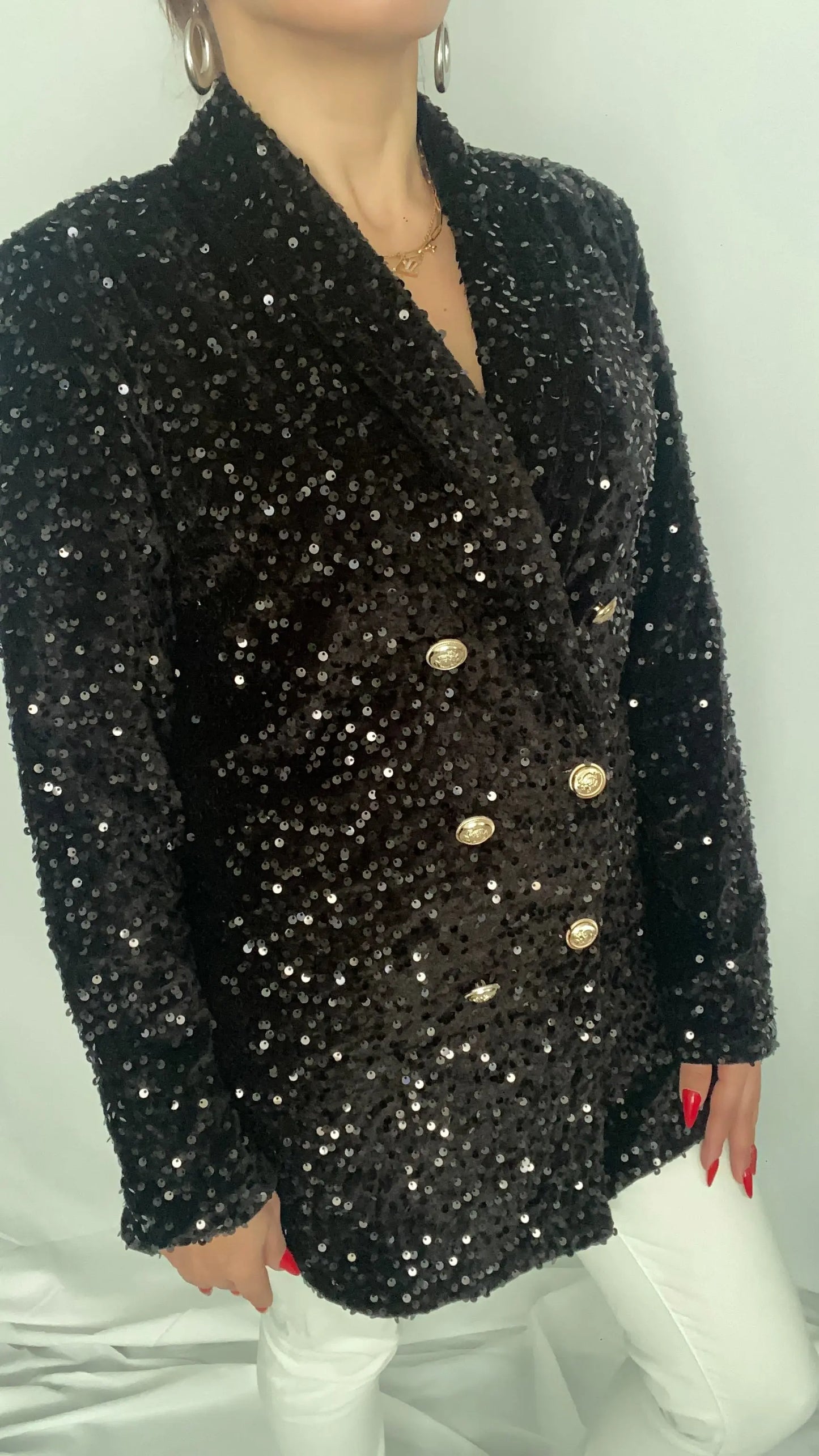 Blazer à paillettes élégant pour femme, veste tendance et brillante, idéale pour un look chic et festif. Parfait pour les soirées et événements spéciaux.