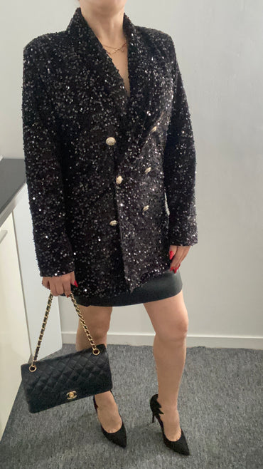 Blazer à paillettes élégant pour femme, veste tendance et brillante, idéale pour un look chic et festif. Parfait pour les soirées et événements spéciaux.